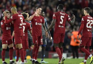 Liverpool end unbeaten Napoli but pass group stage as second.